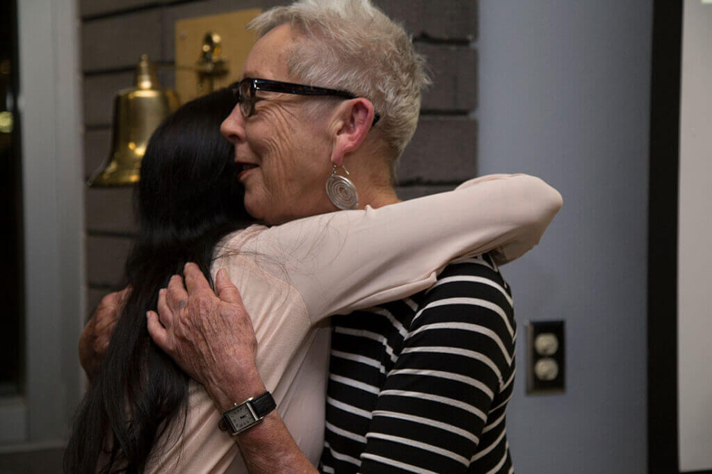 Two people hugging
