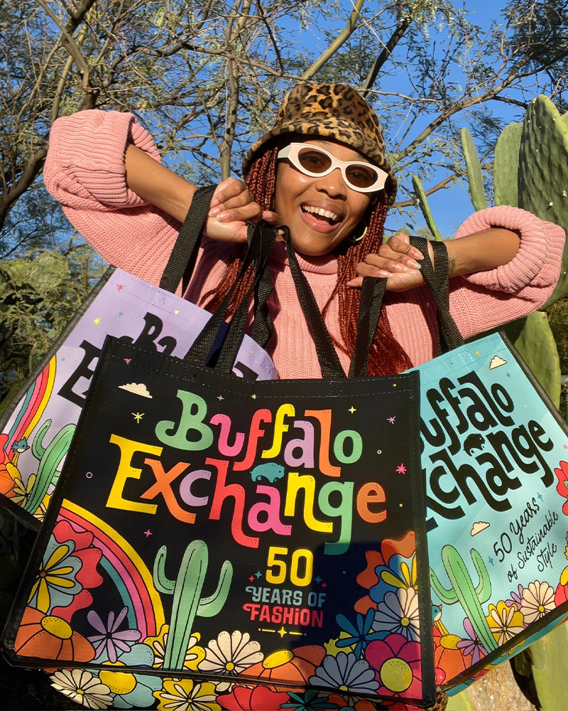 50th Totes Image of a person holding the Buffalo tote bags