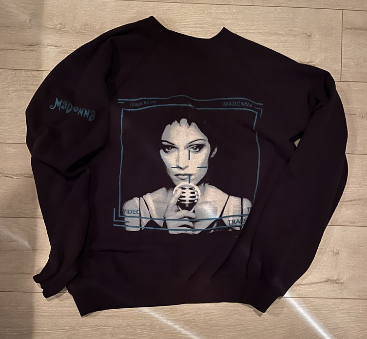 Black Madonna sweatshirt with blue and white graphic