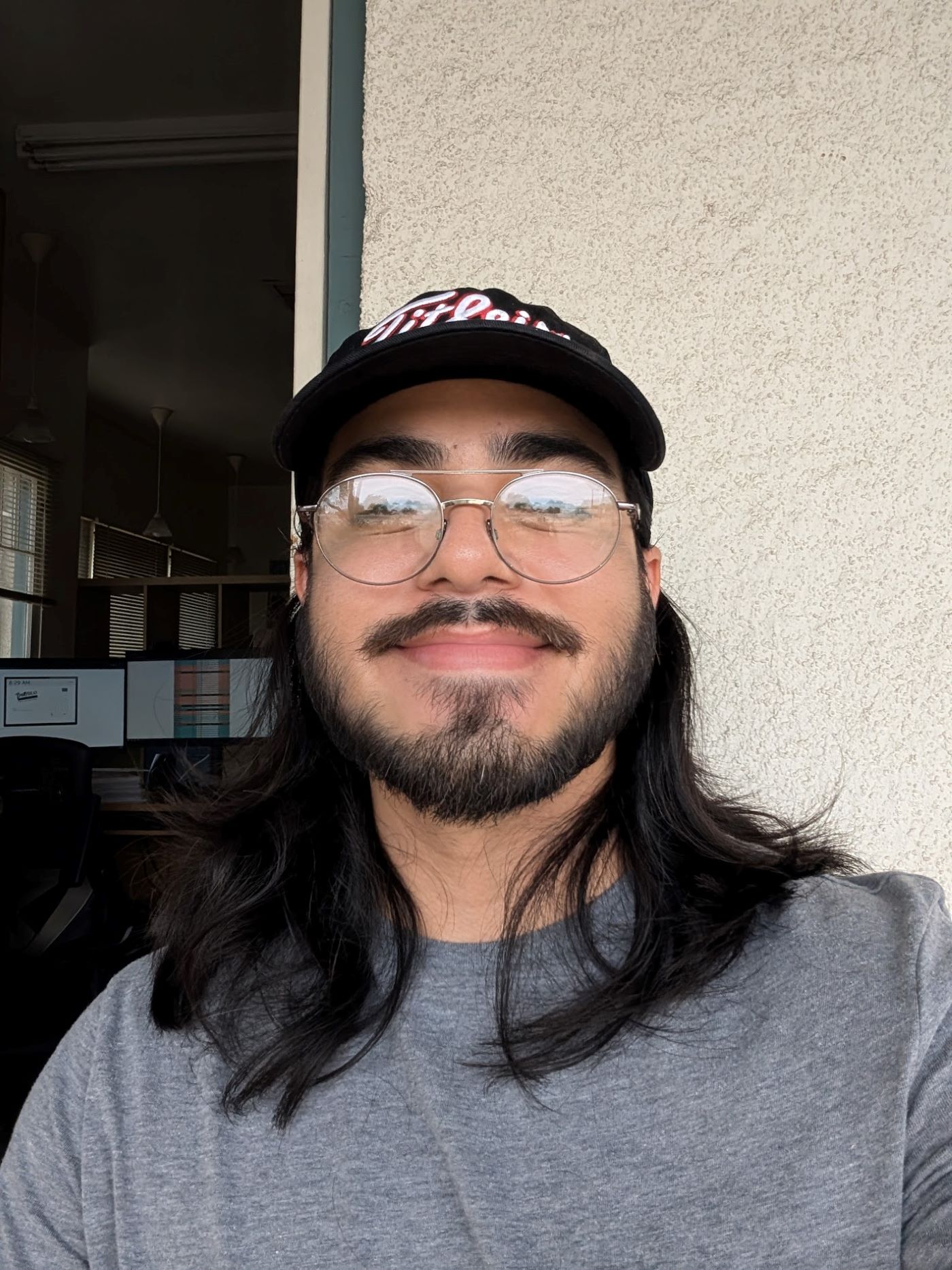 Martin smiling on a porch