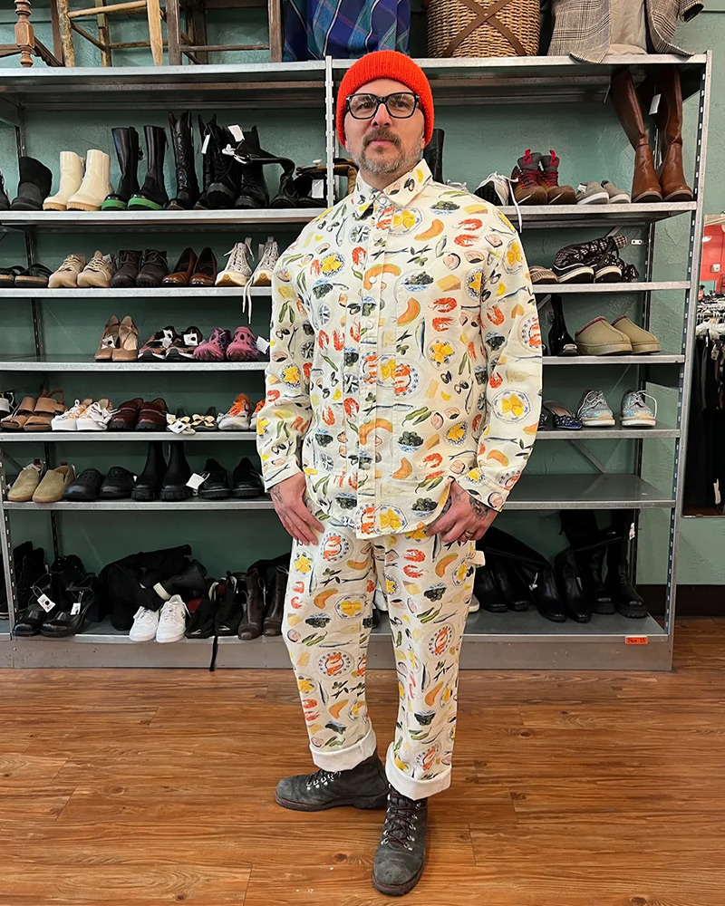 food-suit Employee in colorful suit covered in pictures of food