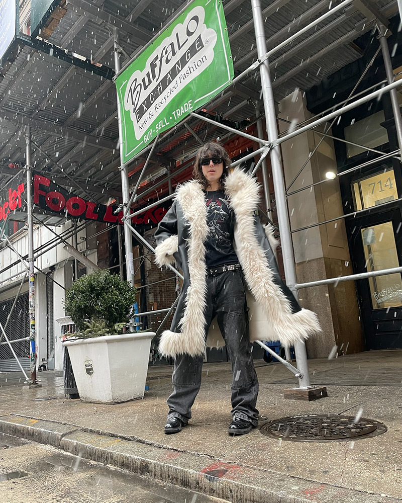 fur-coat-outside-of-store Employee in fur coat