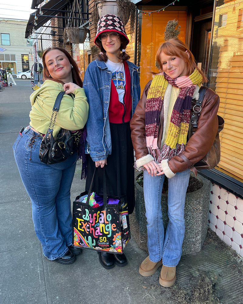 three-friends Three friends posing for the camera with Buffalo tote bag