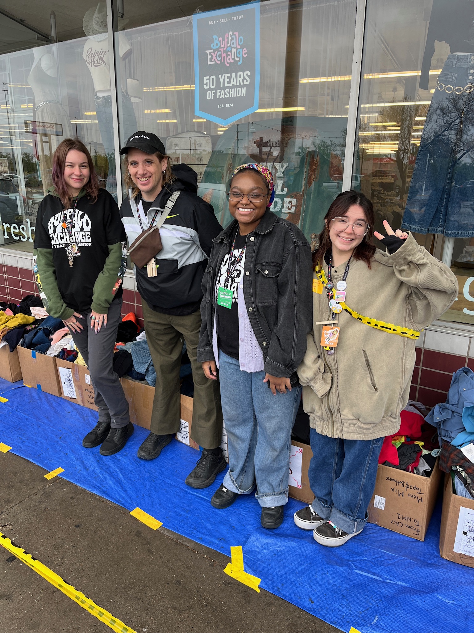 2025.04.19 NM1 Earth Day $1 Sale (7) Group of employees working the dollar sale