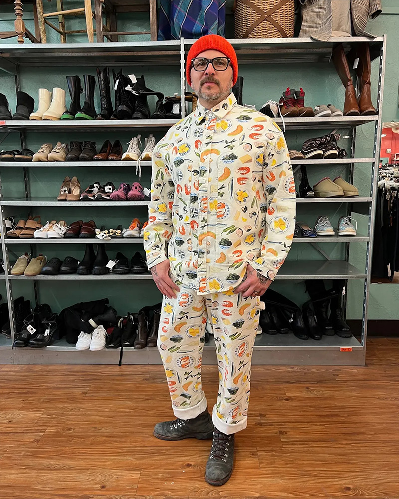 Blog-9-Edited A man wearing a two piece casual suit illustrated with seafood