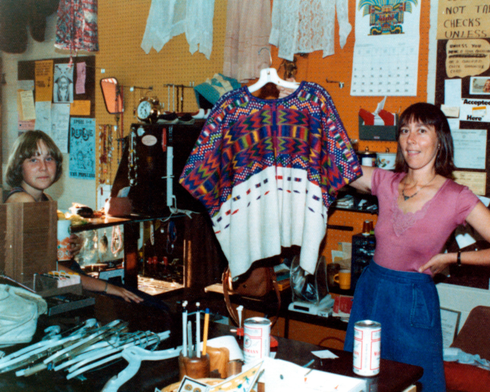 Vintage photo of Kerstin Block holding up a colorful piece of clothing