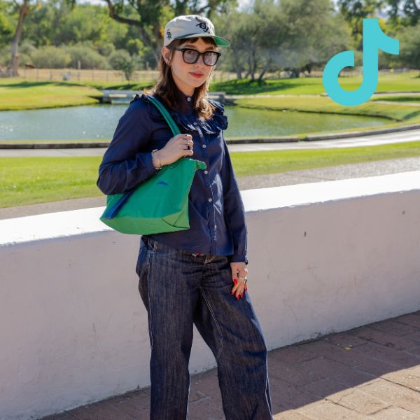 1 person standing in all denim outfit with tiktok logo overlay